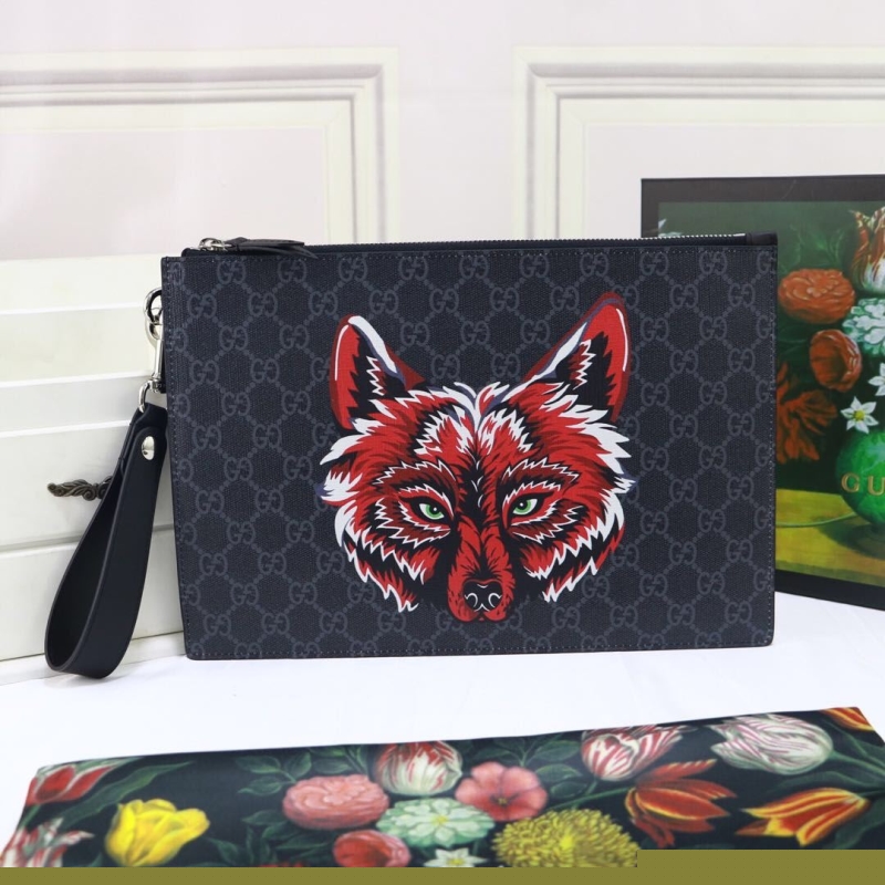 G*u*i clutch bags
